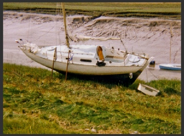 A Contessa 26 aground beside the River Axe - Bristol Channel