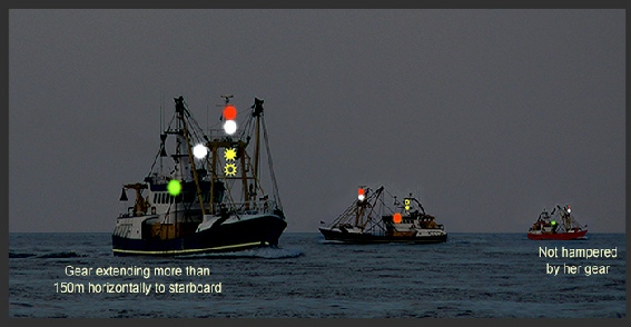 A fleet of fishing vessels at night