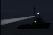 A vessel using a searchlight to indicate a danger