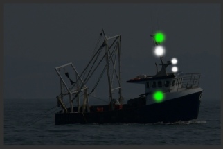 Trawler under 50m making way - seen from starboard - shooting nets