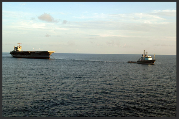 The (decommissioned) USS John F Kennedy under tow in 2007